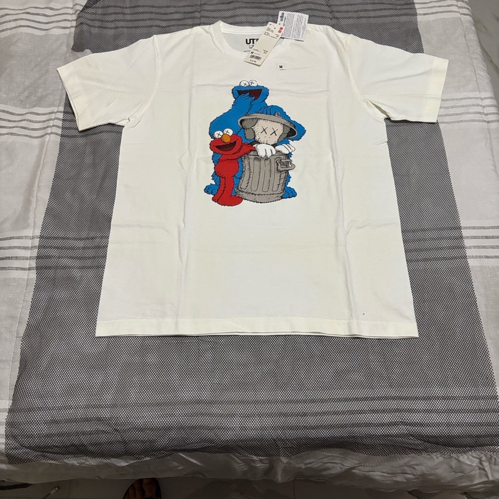 Uniqlo White T-Shirt with Blue and Red Graphic